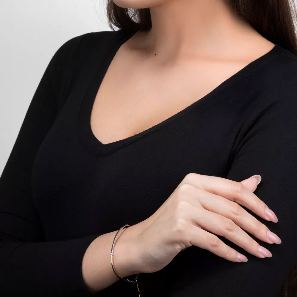 Gold bracelet with black diamonds