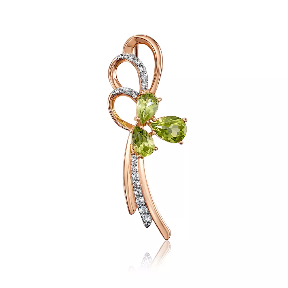 Gold brooch with chrysolite and cubic zirconia