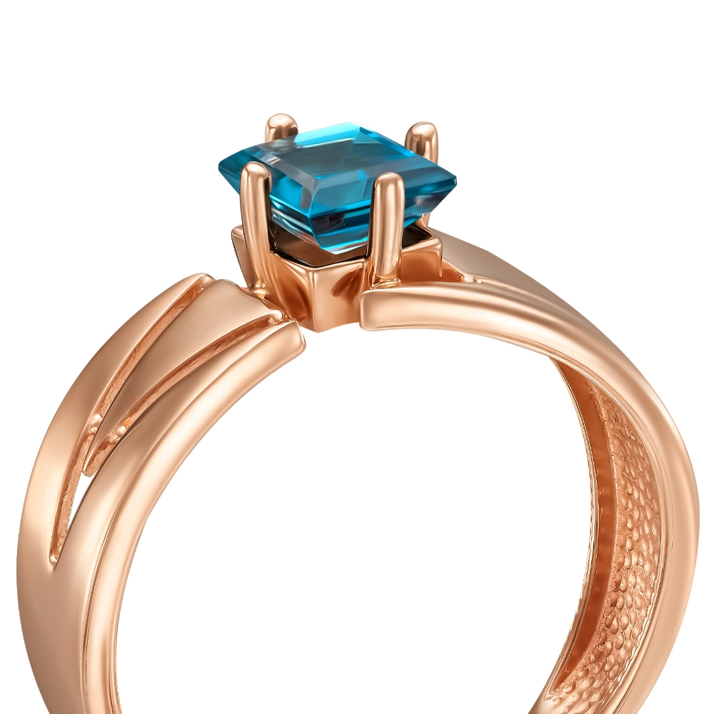 Gold ring with topaz