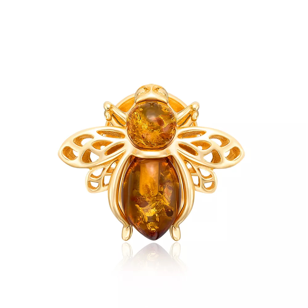 Silver gilt brooch with amber