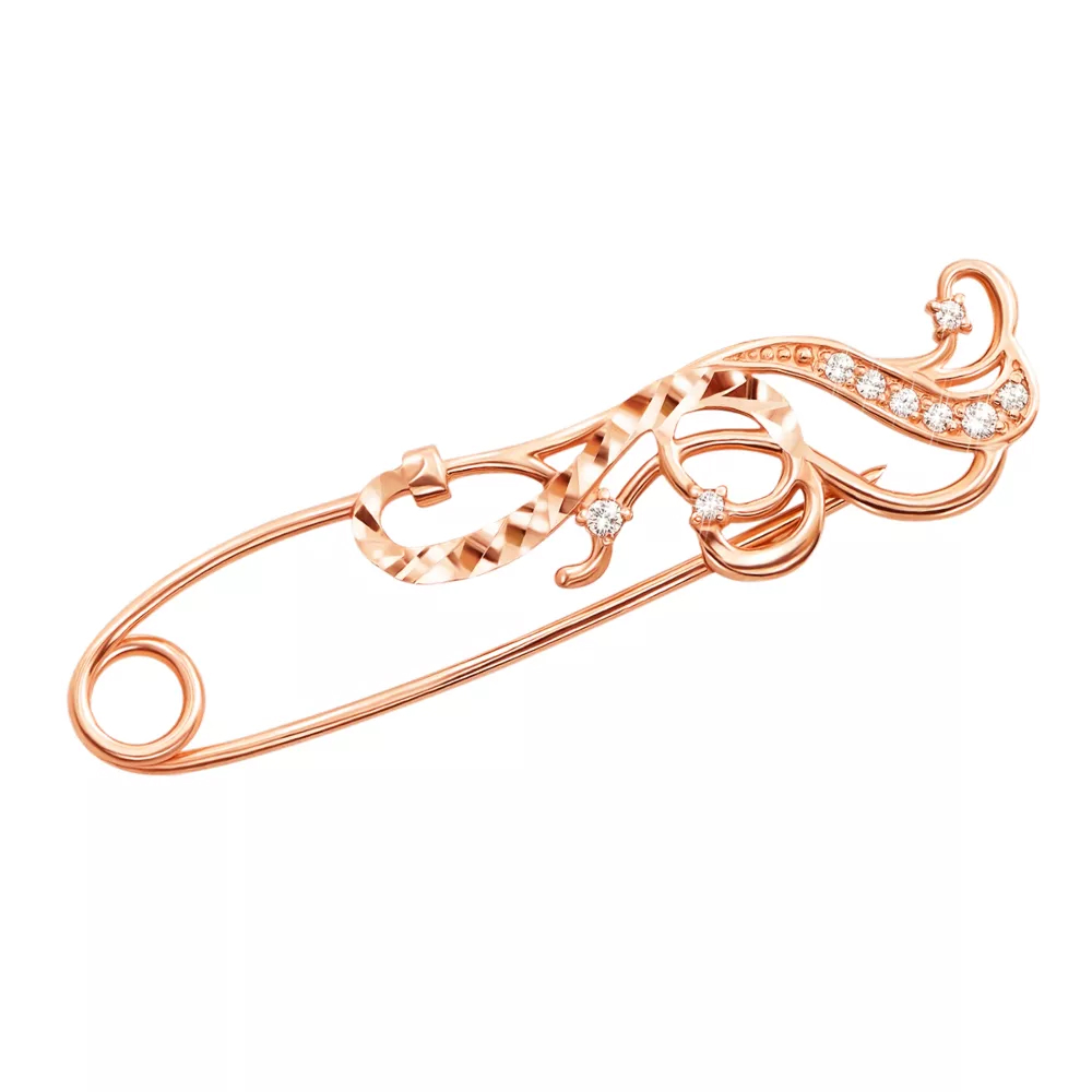 Gold brooch-pin with cubic zirconia