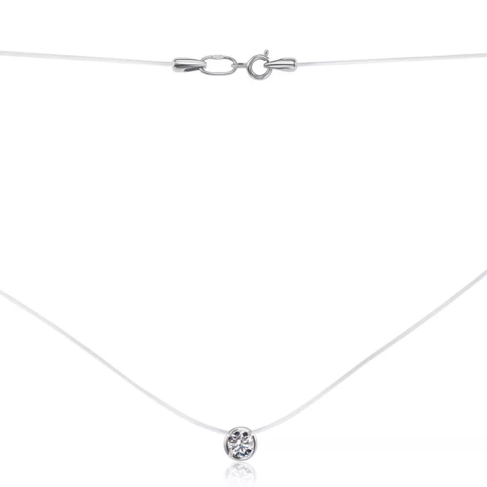 An invisible necklace on a monofilament with cubic zirconia