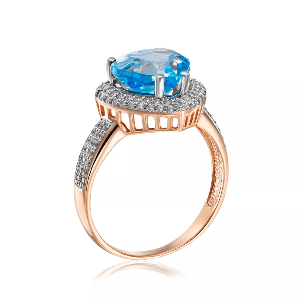 Gold ring with topaz and cubic zirconia