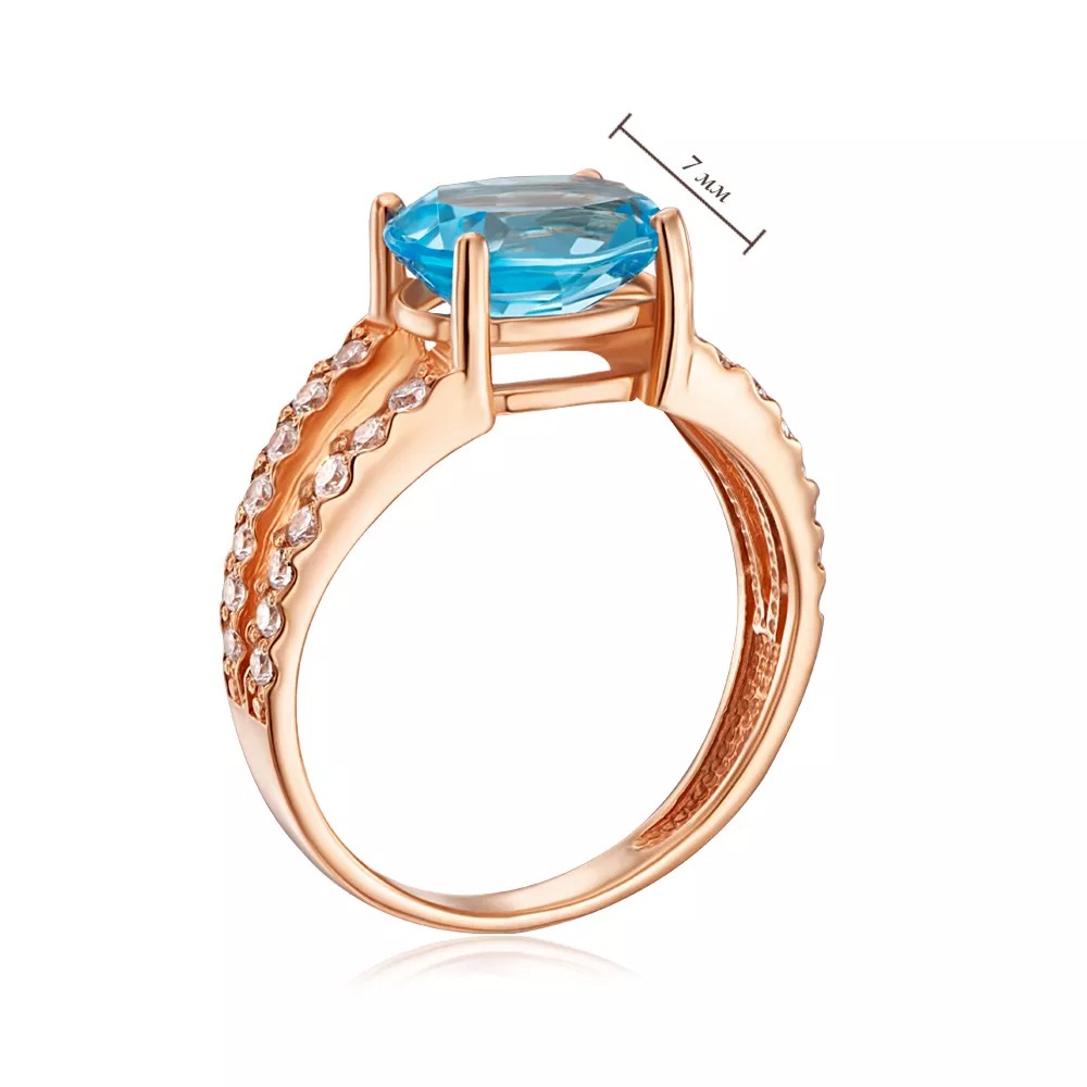 Gold ring with topaz and cubic zirconia