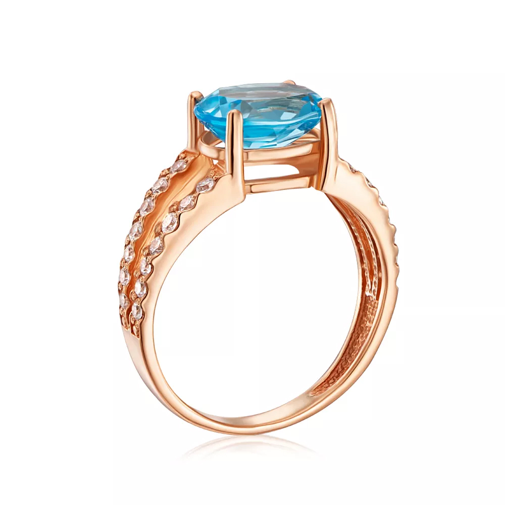 Gold ring with topaz and cubic zirconia