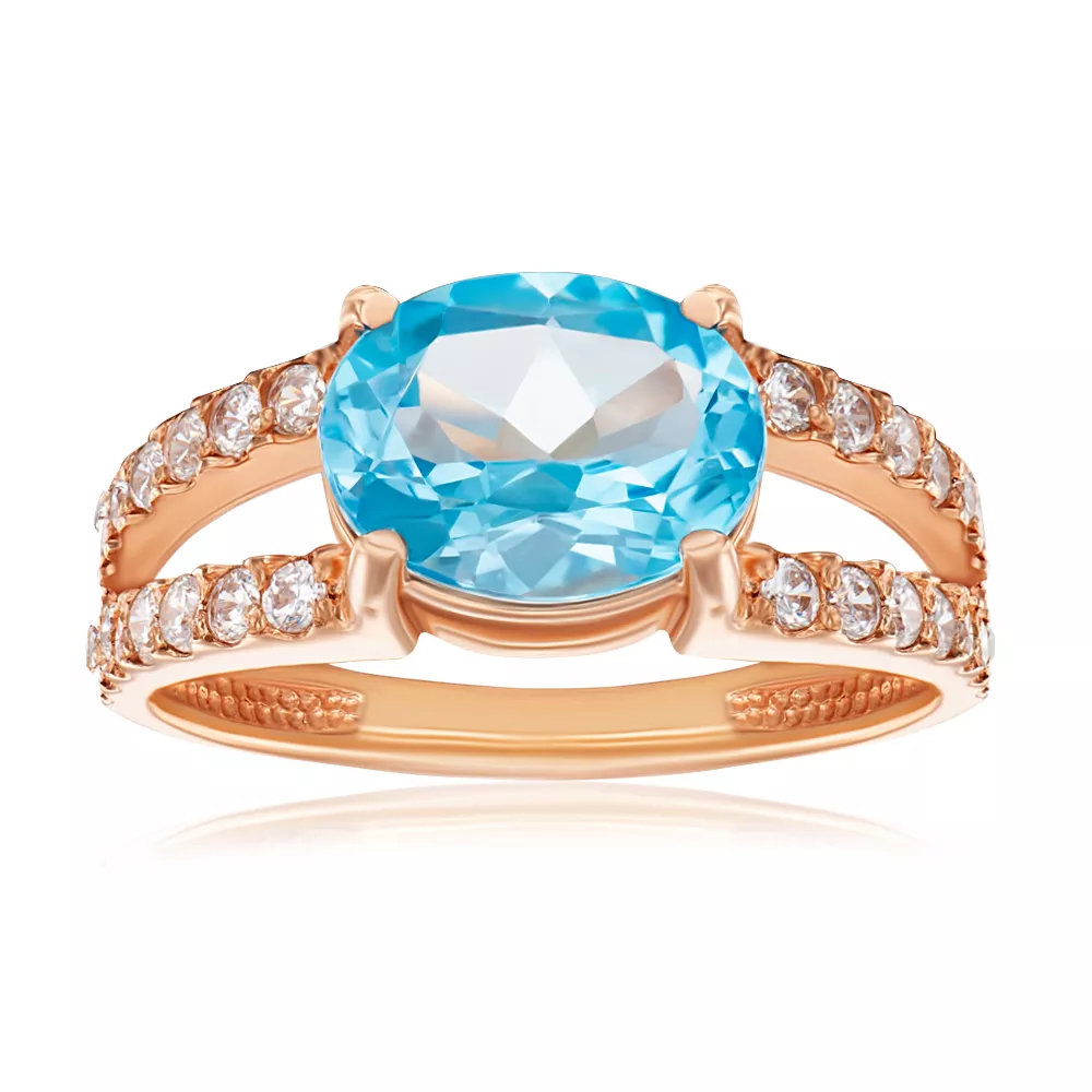 Gold ring with topaz and cubic zirconia