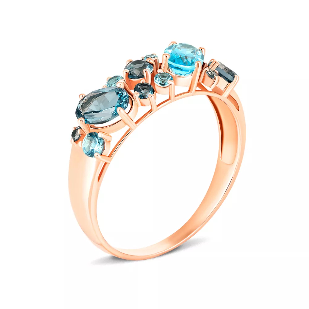 Gold ring with swiss topaz and London topaz