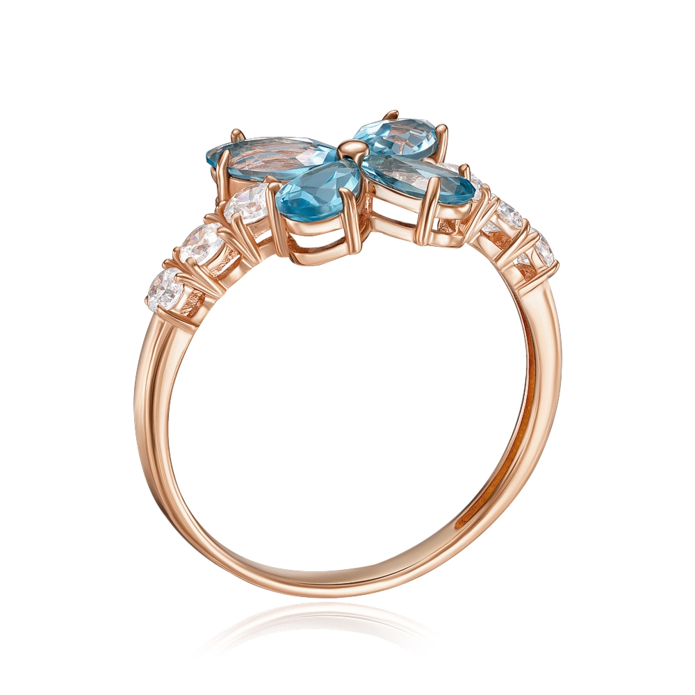 Gold ring with topaz and cubic zirconia