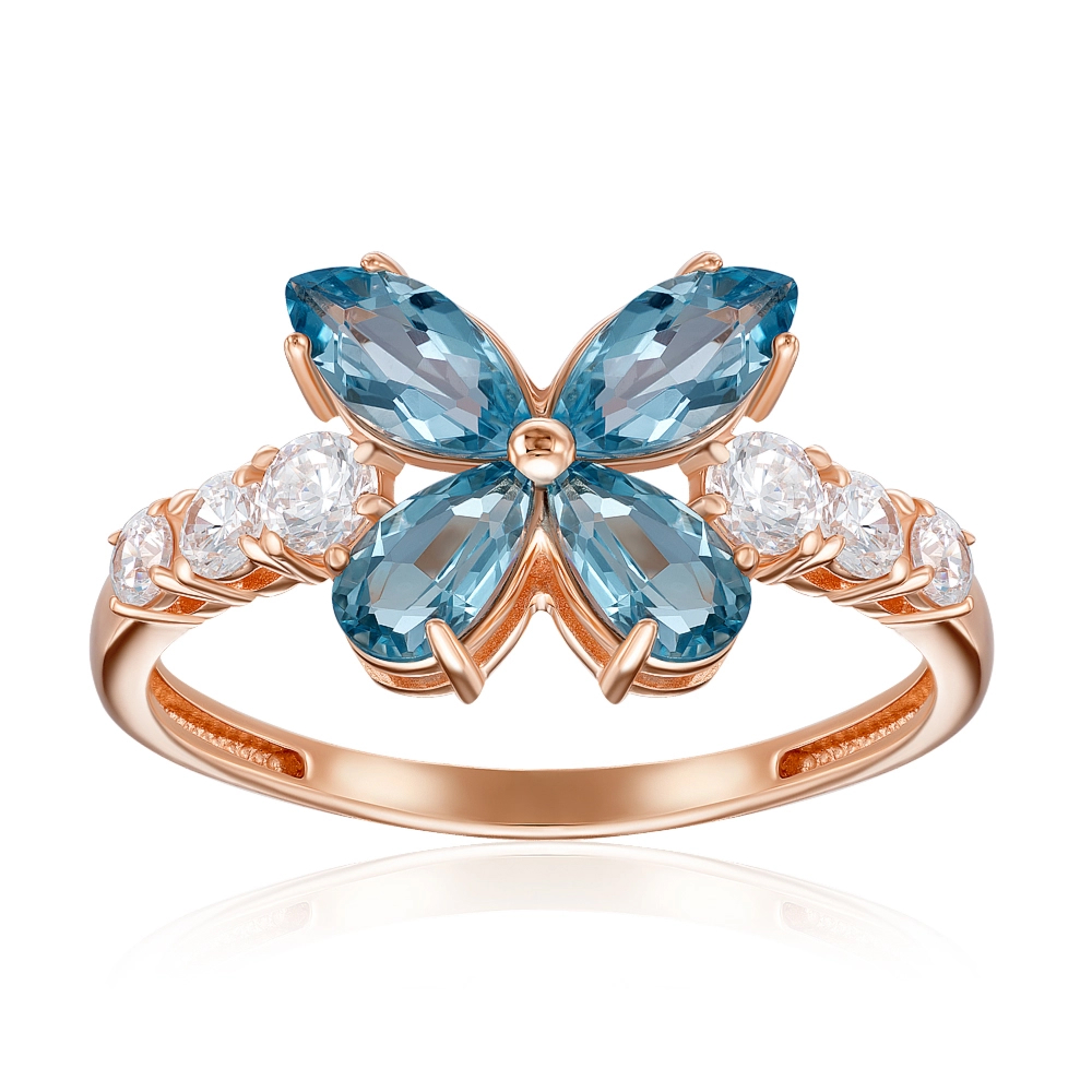 Gold ring with topaz and cubic zirconia