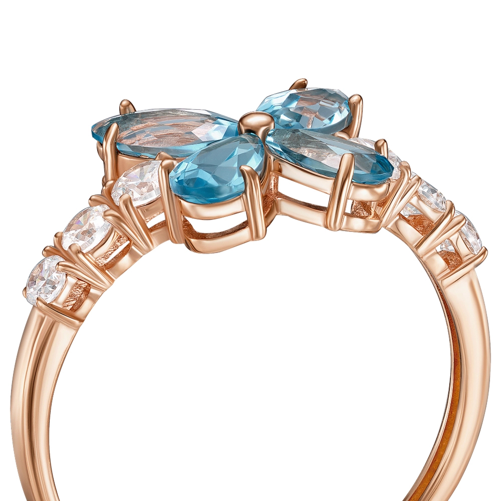 Gold ring with topaz and cubic zirconia