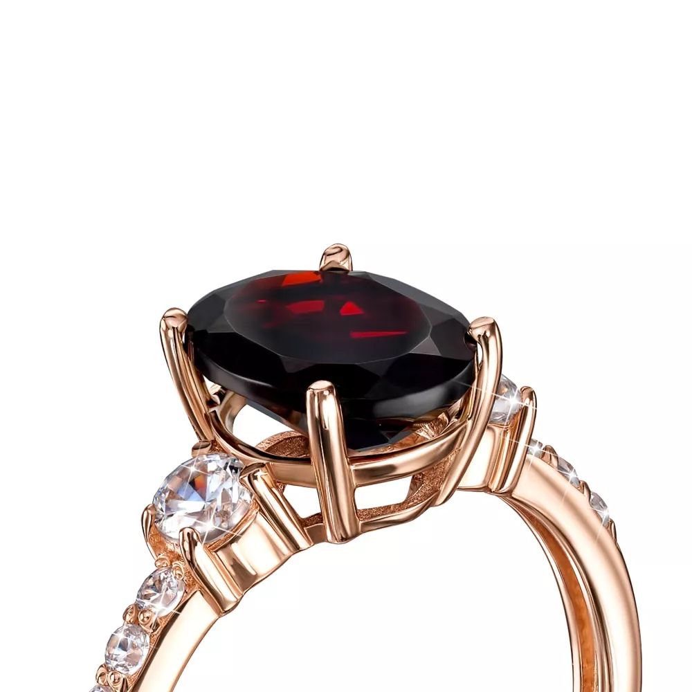 Gold ring with ruby and cubic zirconia