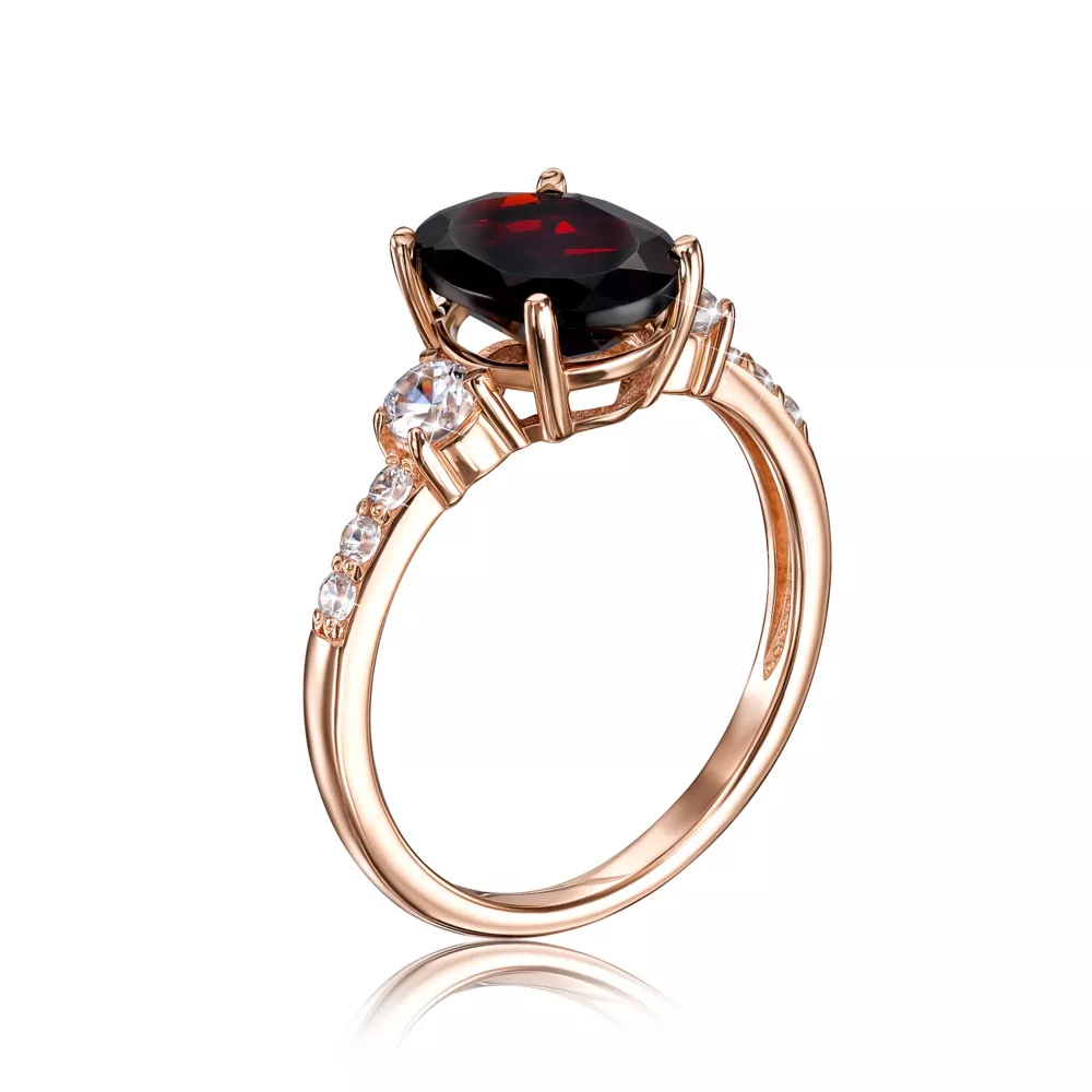 Gold ring with ruby and cubic zirconia