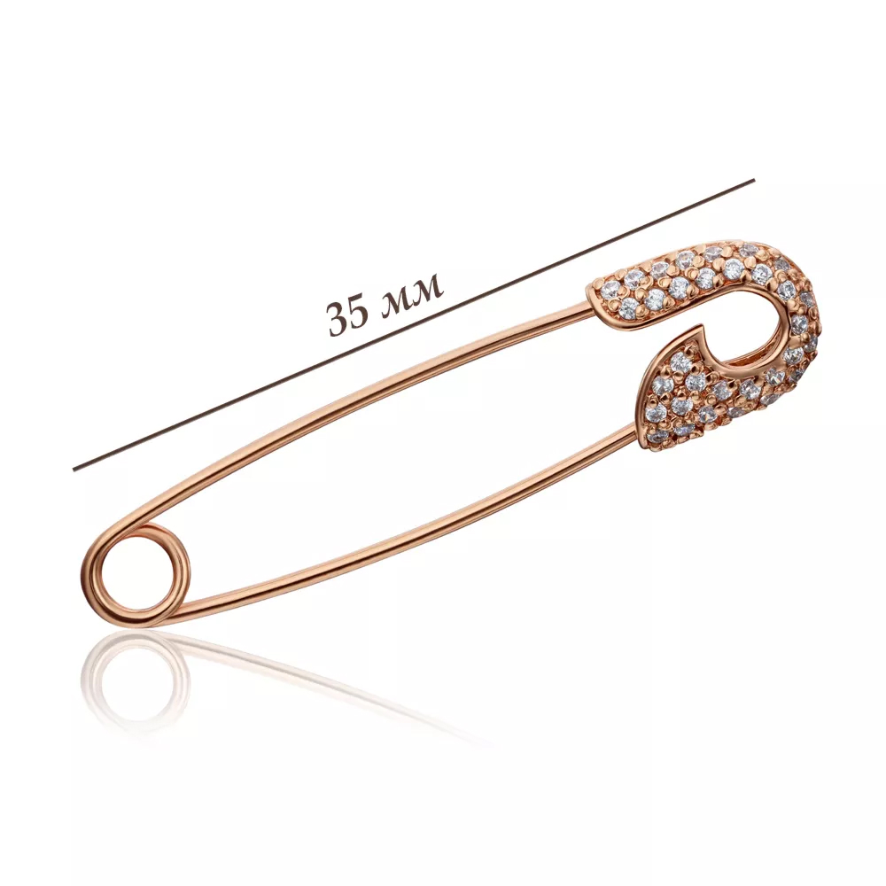 Gold brooch-pin with cubic zirconia