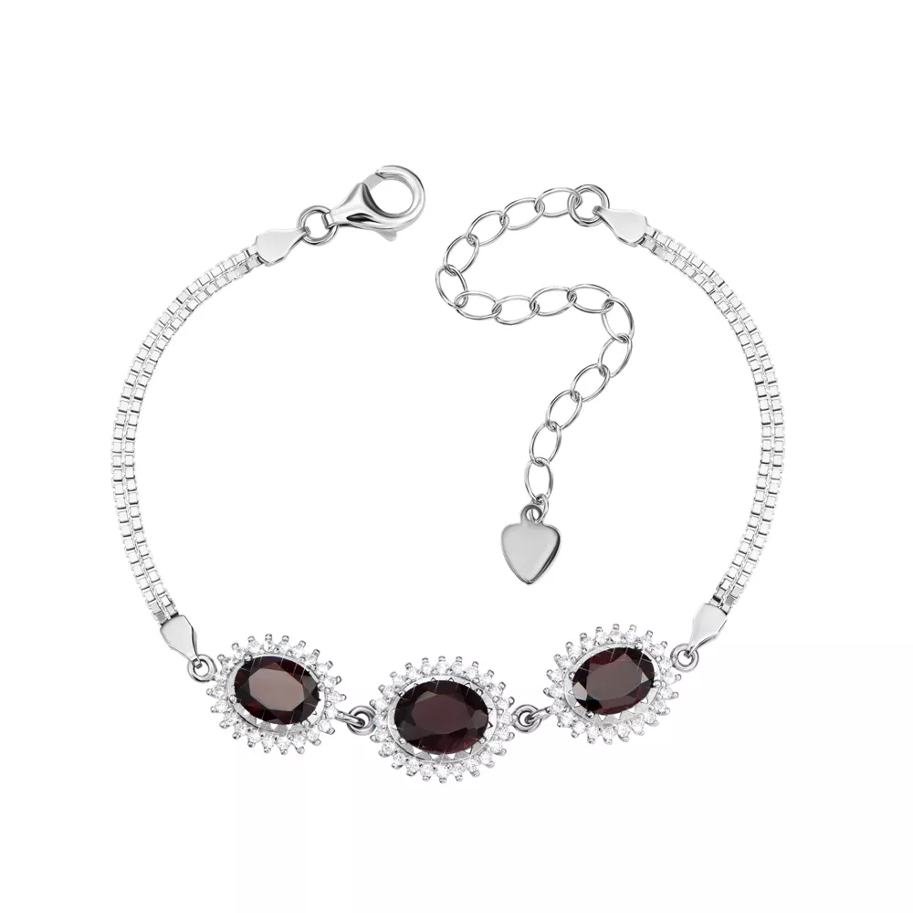 Silver bracelet with garnets and cubic zirconia