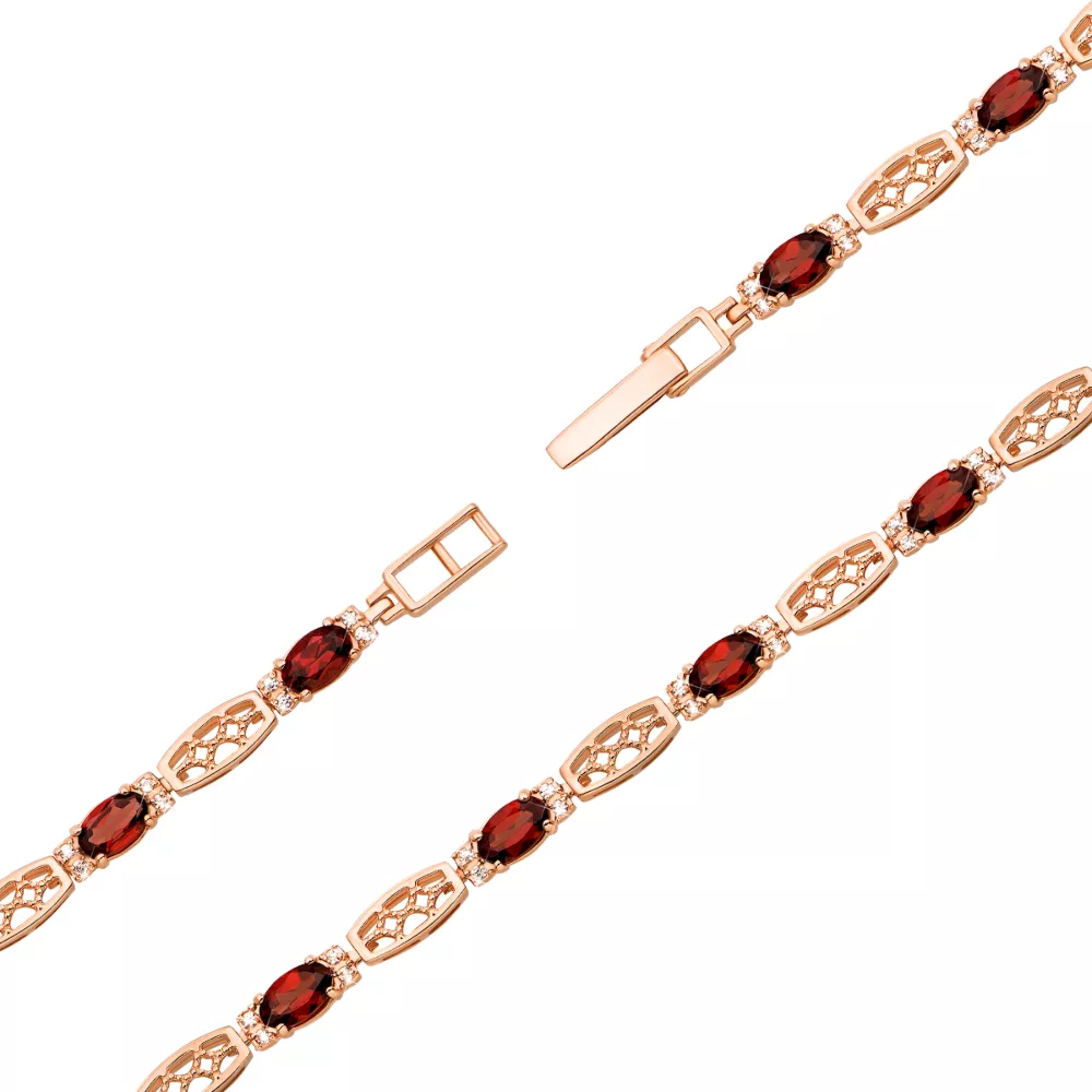 Gold bracelet with garnet and cubic zirconia