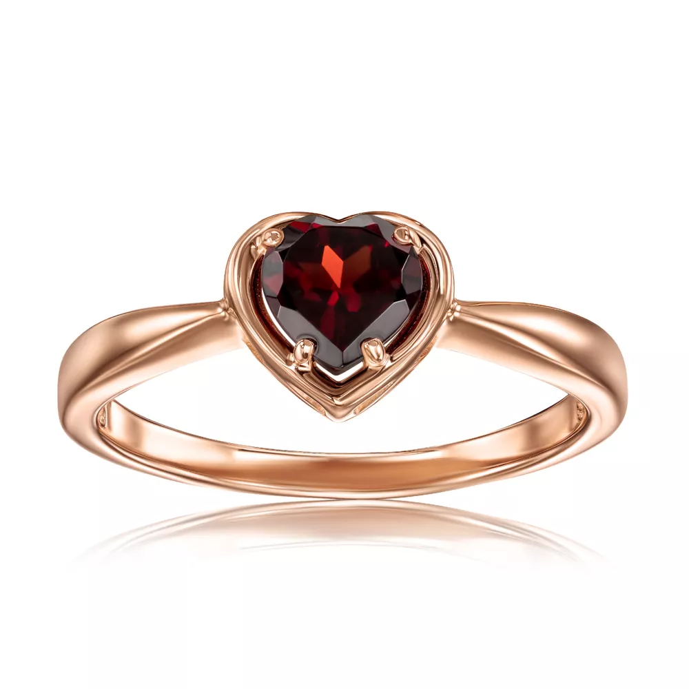 A gold ring with a ruby