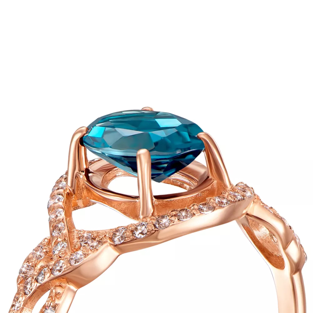 Gold ring with London topaz and cubic zirconia