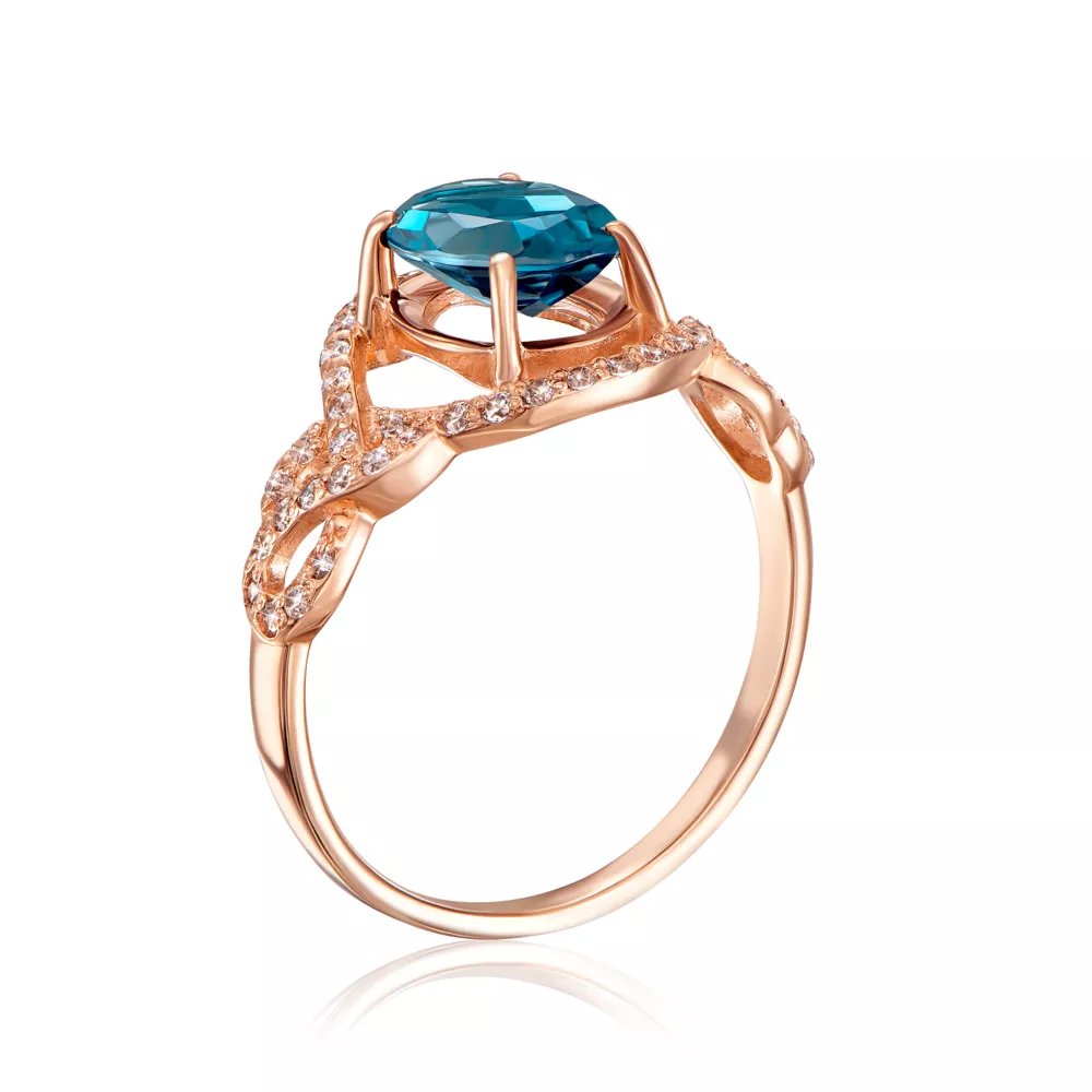 Gold ring with London topaz and cubic zirconia